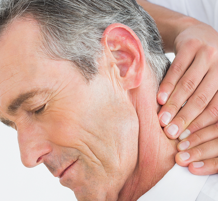 Chiropractor discussing a multi-modal treatment plan with a patient
