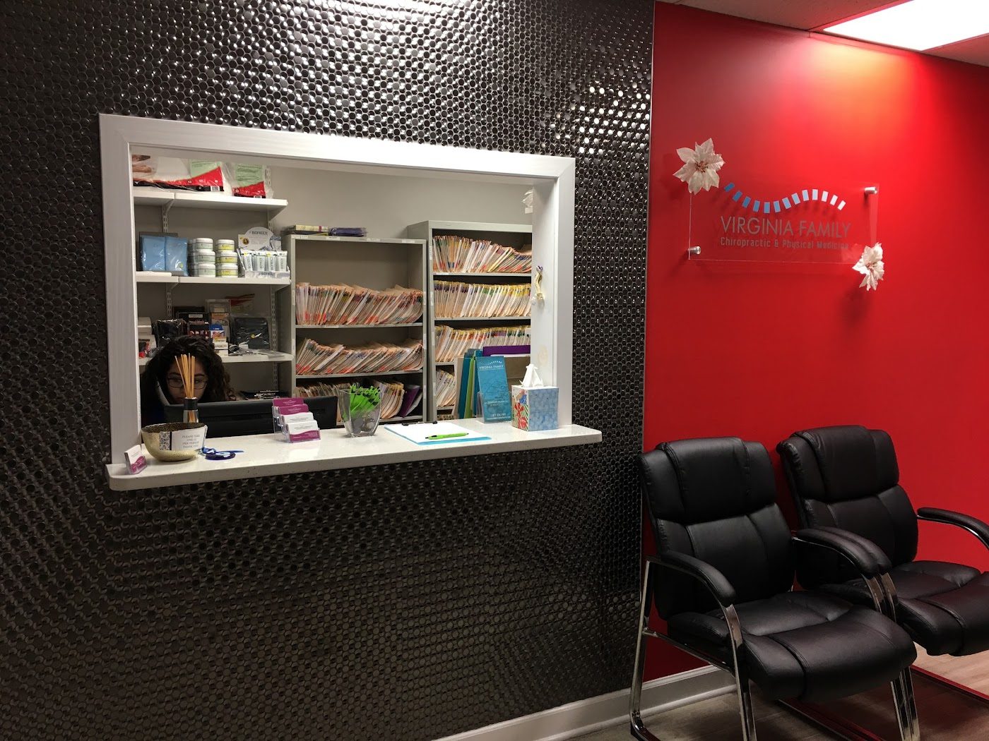 Front desk and waiting area at the Virginia Family Chiropractic office on Richmond Highway in Woodbridge, VA